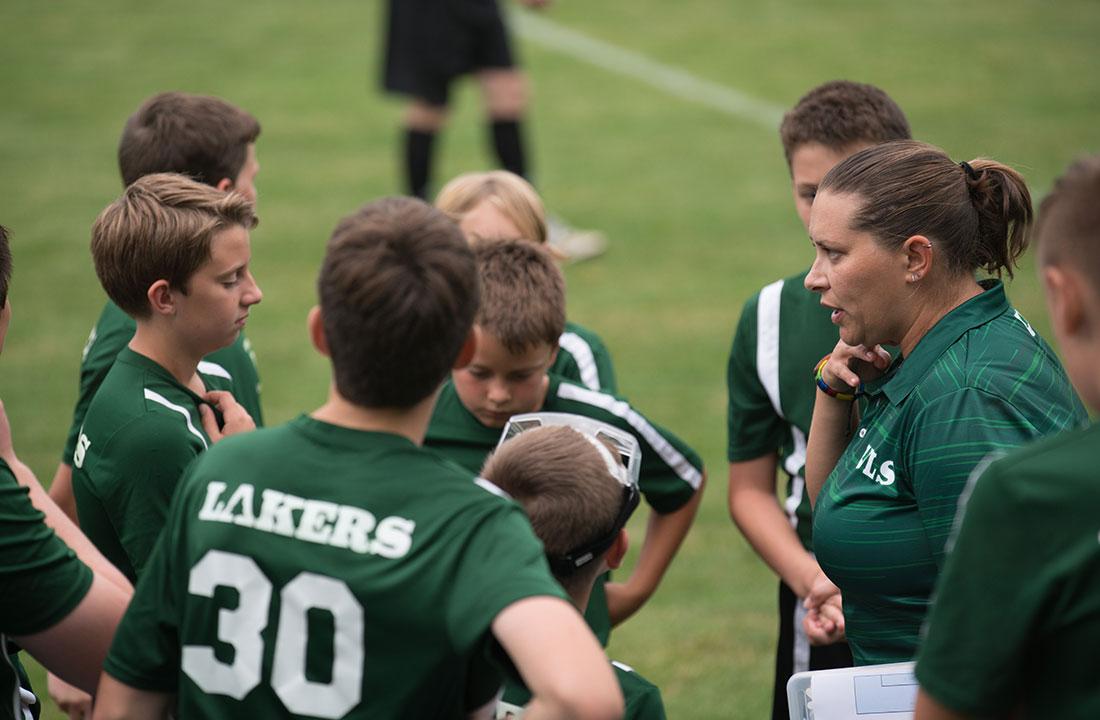 middle school boys soccer hudle