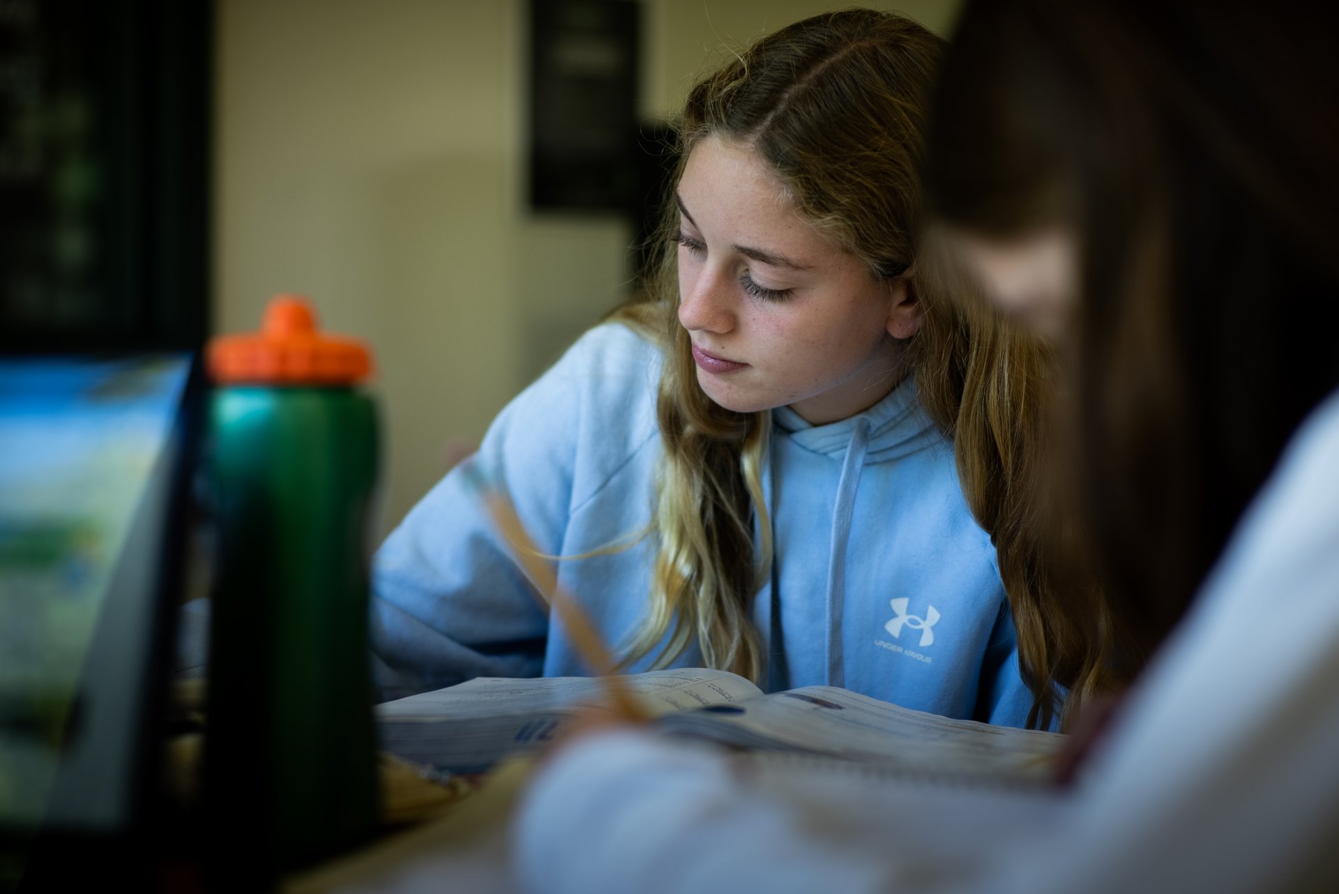 students discussing at desks